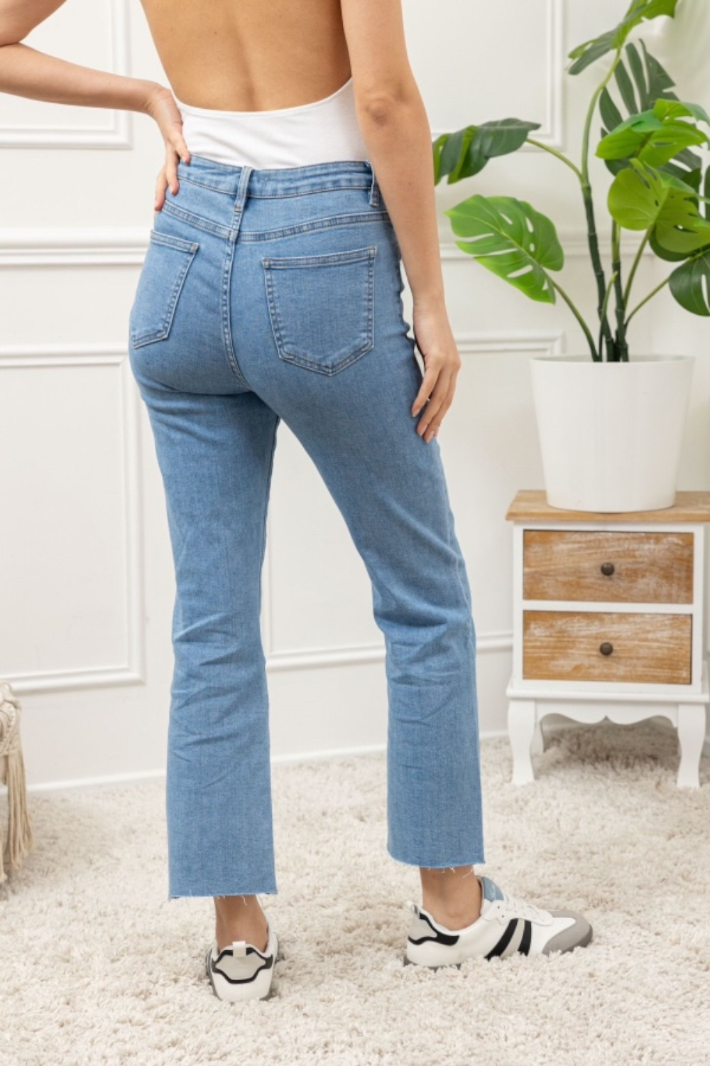 Jeans bleu détail poches tressées