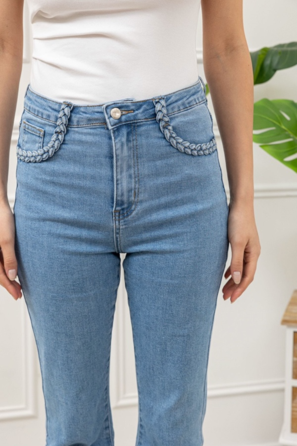 Jeans bleu détail poches tressées
