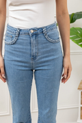 Jeans bleu détail poches tressées